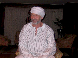 Photo Of Wilf Smith reclining in Egyptian Kaftan and turban